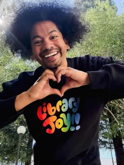 Mychal Threets: Library Joy Unisex Sweatshirt (Print Shop)